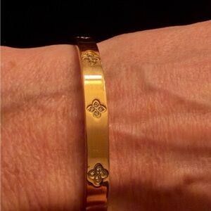 Gold tone, clover cuff bracelet